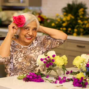 Senior lady doing flower arrangments