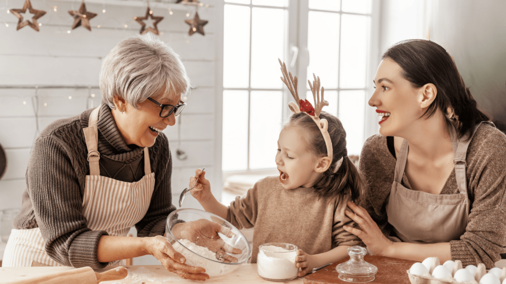 grandma, mom and daughter baking together