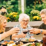 couple dining with older woman
