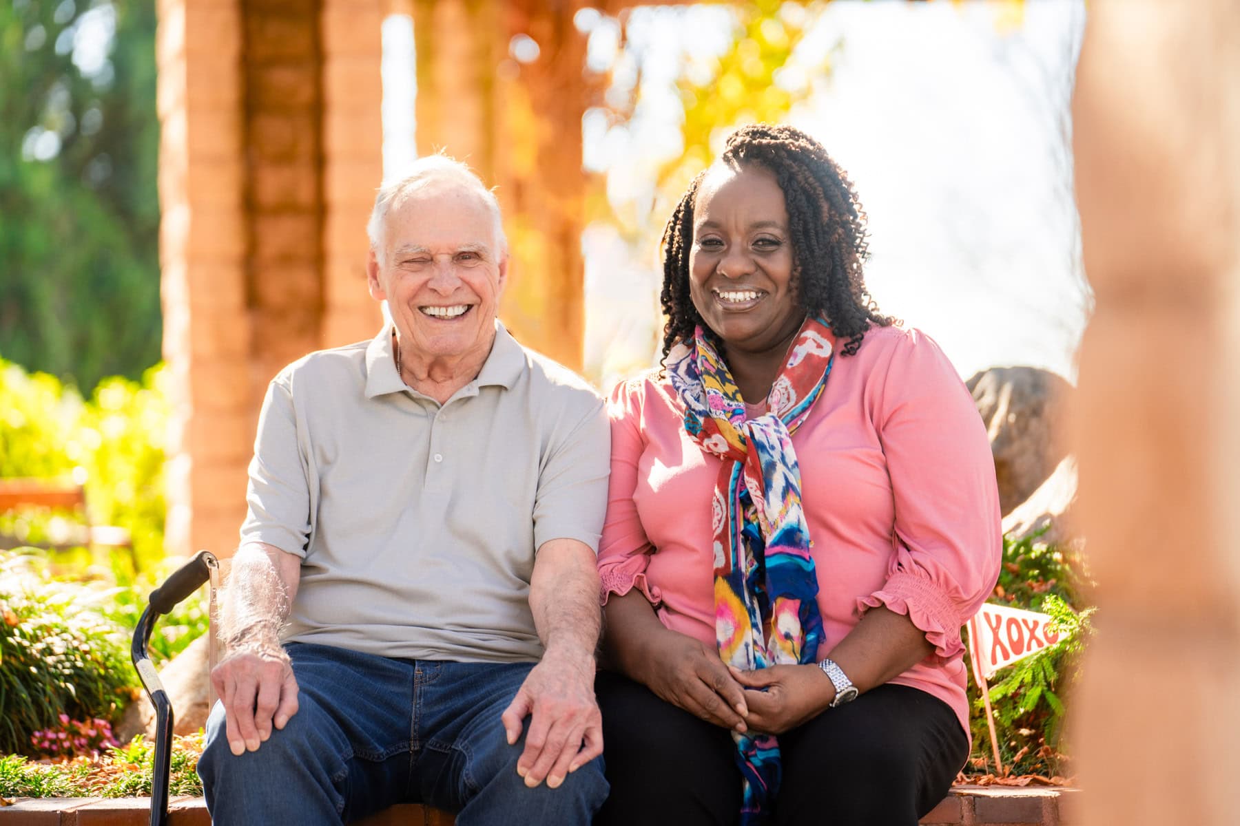 old man sitting with woman