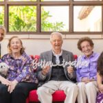 group photo of team members and residents