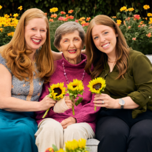 Family shot, senior lady and her two adult daughters