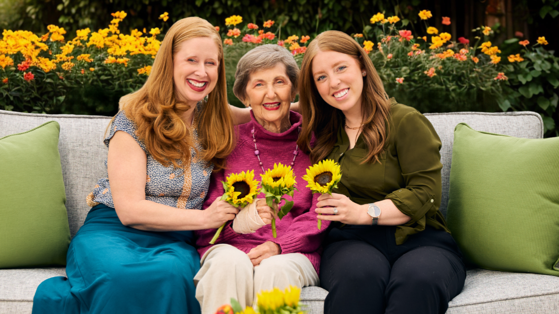 Family shot, senior lady and her two adult daughters